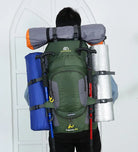 The Outdoor Backpack 60L is suitable for carrying clothing, gear, and essentials on longer trips. With a 60-liter capacity, it offers multiple compartments for organized storage. Adjustable straps allow the backpack to be fitted as needed. A handle and shoulder straps make it convenient to carry. Additional features include trekking pole straps, hip storage, and a drawcord for securing clothing.